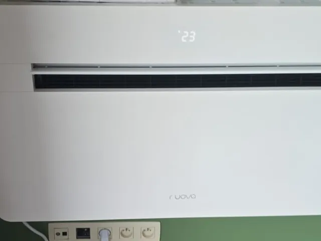Nuova monoblock tegen een groene muur in een appartement in Kinrooi